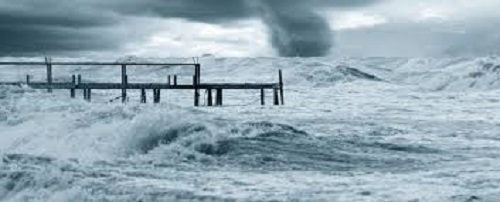 Water Churning Over Pier